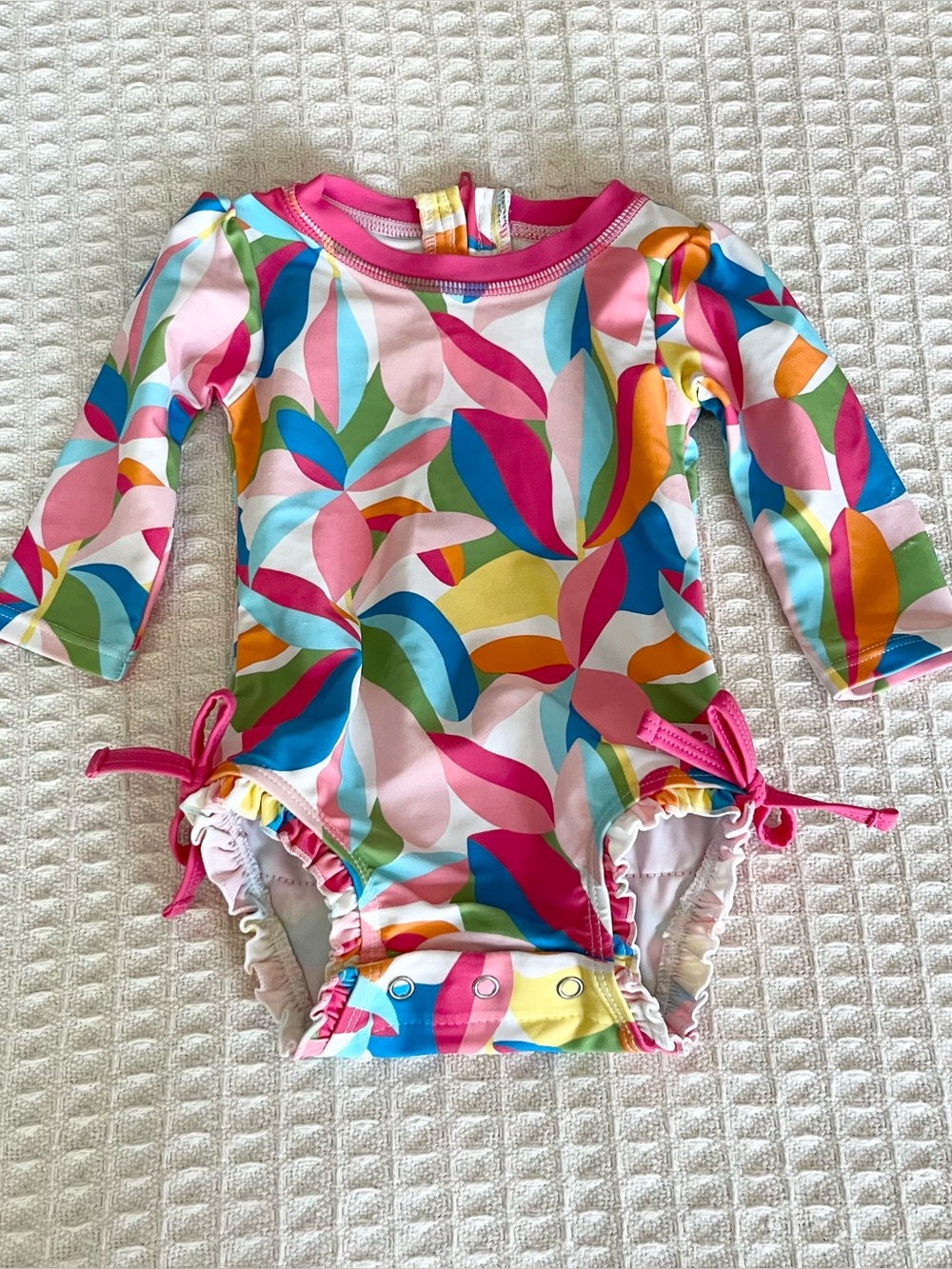 Ruffle Butts Multicolor Long Sleeve One-Piece Swimsuit with Pink Trim 3-6M